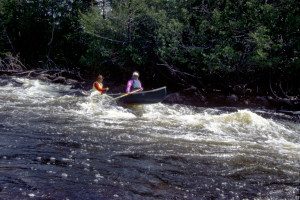 Larry and Rob fly through Wavy Rapids.