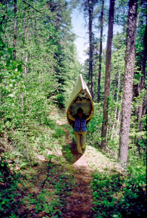 Portaging a Canoe.