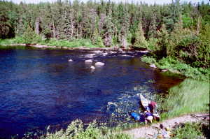 Rob and Jim struggle to load the canoe.